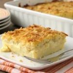 pineapple casserole Freshly baked pineapple casserole with a golden-brown Ritz cracker topping in a white dish