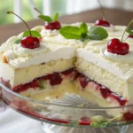 Close-up of Heaven on Earth Cake with layers of angel food cake, pudding, and cherry pie filling